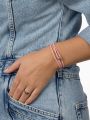 Charm armband roze